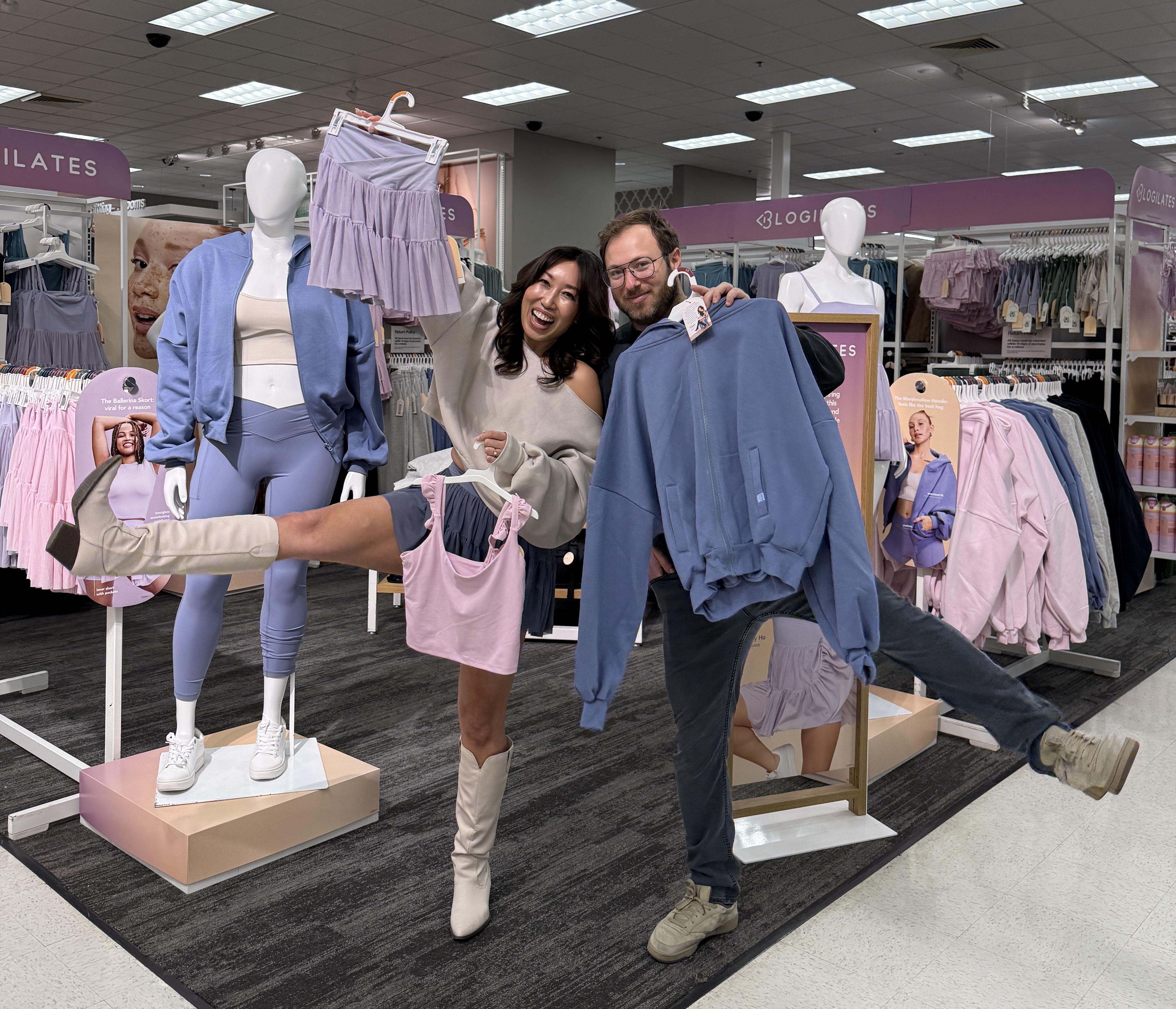 Cassey Ho ’09 and Sam Livits ’08 stand next to their new Blogilates line at Target. | Courtesy Blogilates