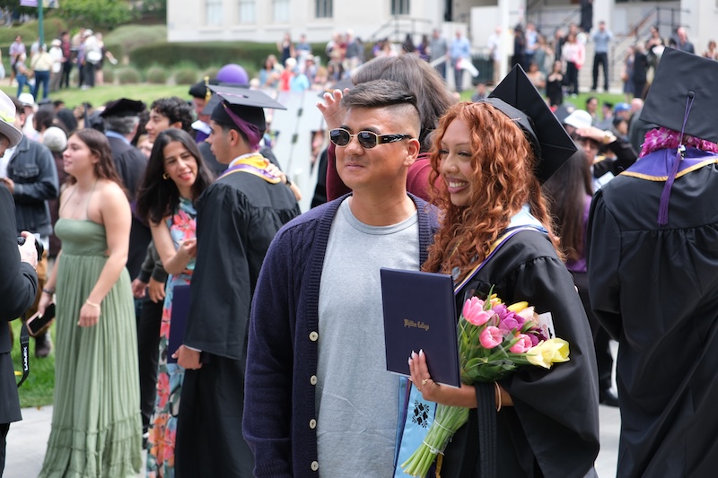 Grad posing for a photo