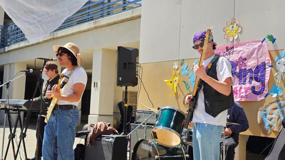Presented by KPOET Radio, a live band plays at Whittier College’s Campus Courtyard.