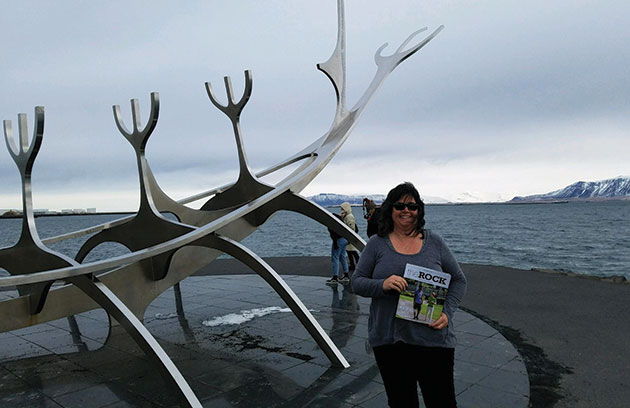 Cynthia Greenup holding a copy of The Rock magazine