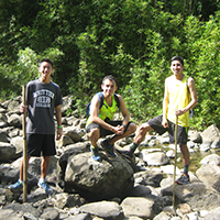 Ruben Salorza and two other students pose for a photograph in Hawaii during an environmental trip.