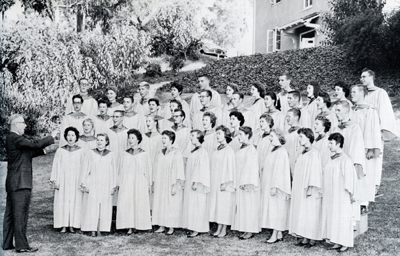 A photo from 1960 shows then Choir Director Eugene M. Riddle as he leads Whittier’s A Cappella Choir in song. 