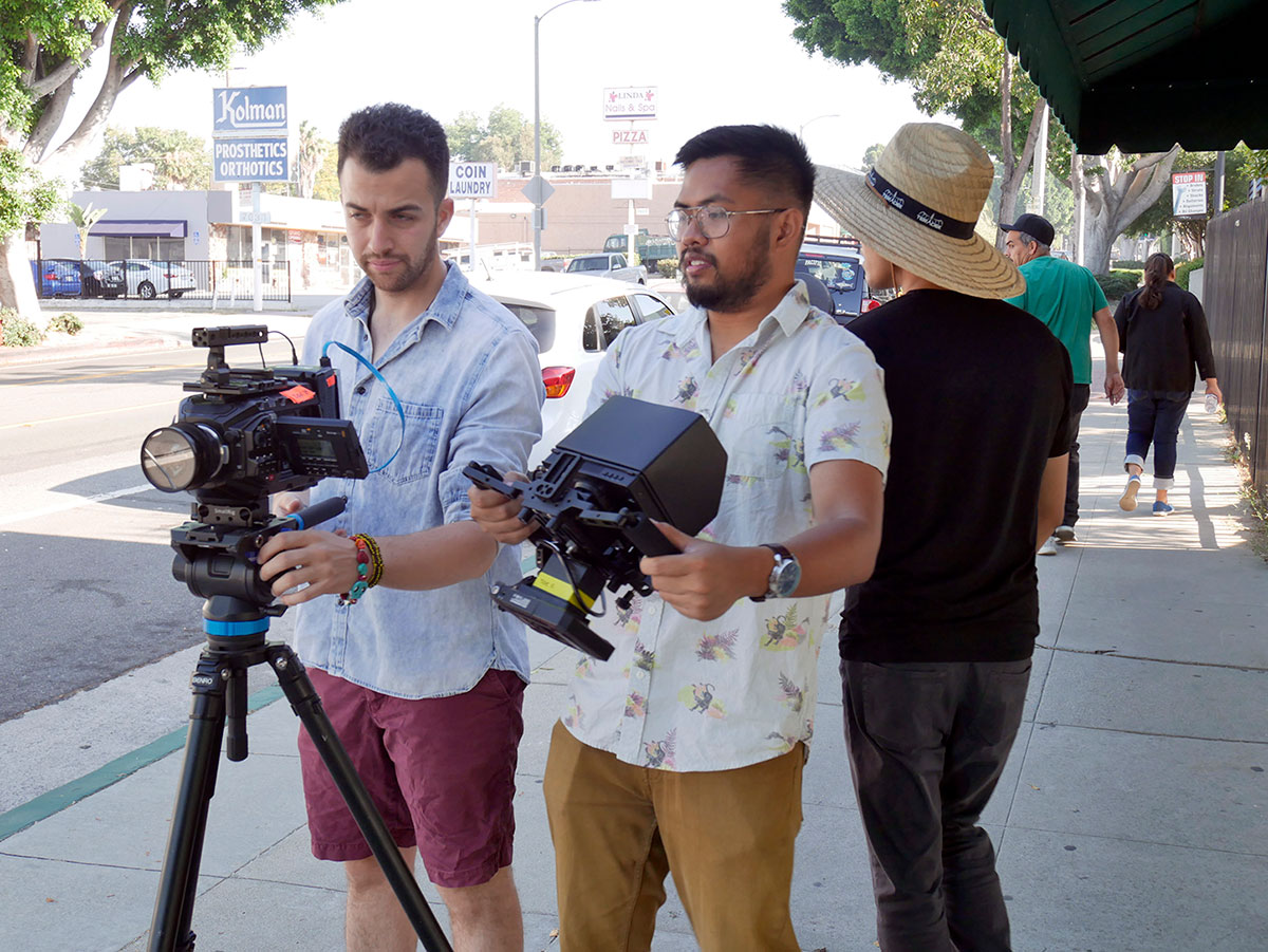 Recent alumni and students work on a film project in Whittier.