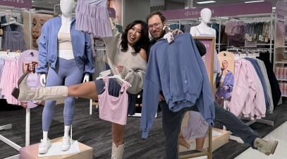 Cassey Ho ’09 and Sam Livits ’08 stand next to their new Blogilates line at Target. | Courtesy Blogilates