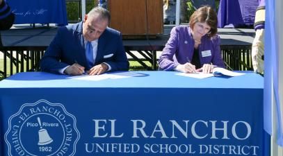 President Kristine Dillon '73, right, signs an agreement with El Rancho High School to support students and guarantee admission. | Whittier College