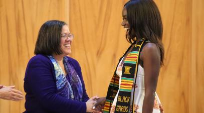 President Linda Oubre with student at Whittier College Black Student Graduation Ceremony