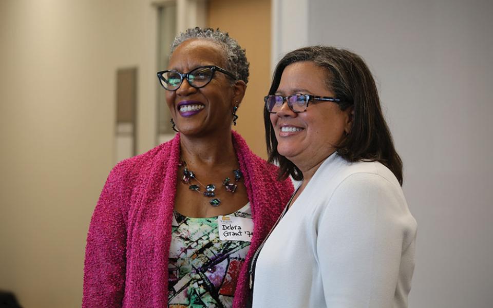 An alumna and Linda Oubre.