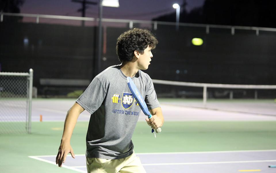 Student playing pickleball