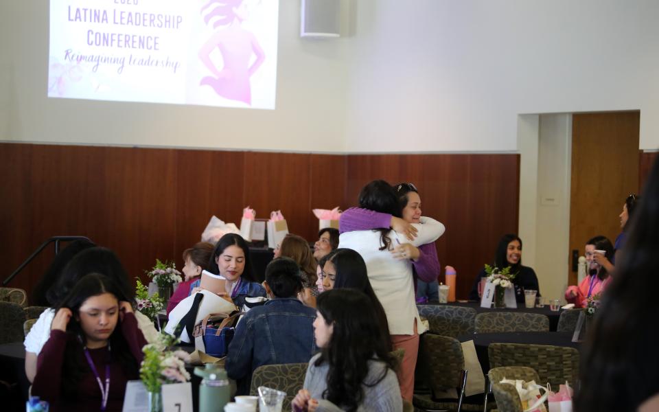 Participants hugging